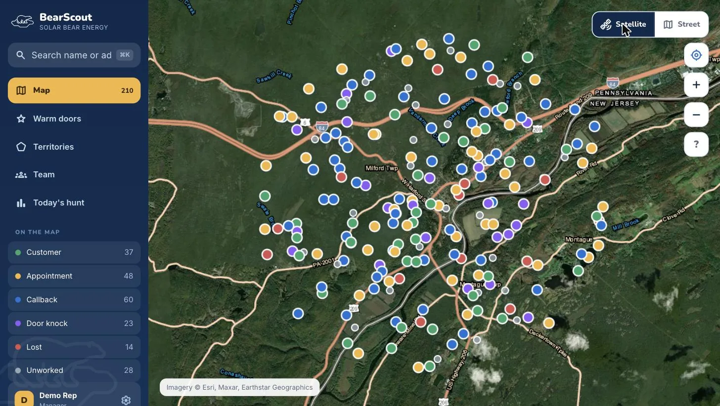 The canvassing map: colour-coded door pins over a satellite view